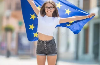 cute-happy-young-girl-flag-european-union-streets-somewhere-europe-cute-happy-young-girl-flag-151778310